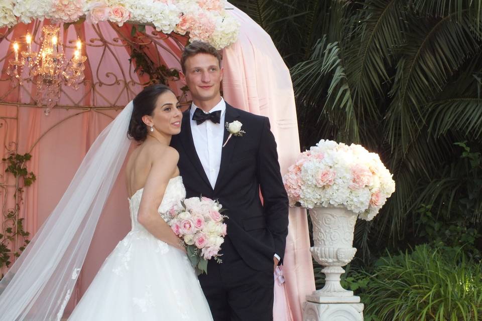 Newlyweds with the officiant