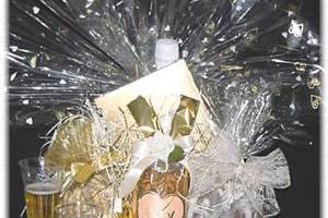 We�ve put together a gorgeous basket
of White, Beige and Gold including  gourmet chocolates, a bottle of Martinelli Cider and Glasses to toast each other, a Salty Snack Mix, Chocolate Drizzled Caramel Popcorn with Almonds, Chocolate Caramel Peanut Clusters, and a Romantic Music CD to set the mood.
(products may vary)
As shown $50.00