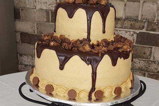 Groom's Table. Chocolate Cake with Peanut Butter Buttercream topped with Chocolate Ganache and Reese Cups