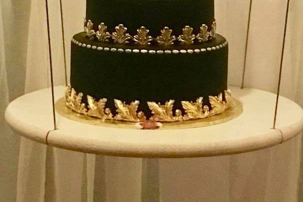 Black wedding cake with gold