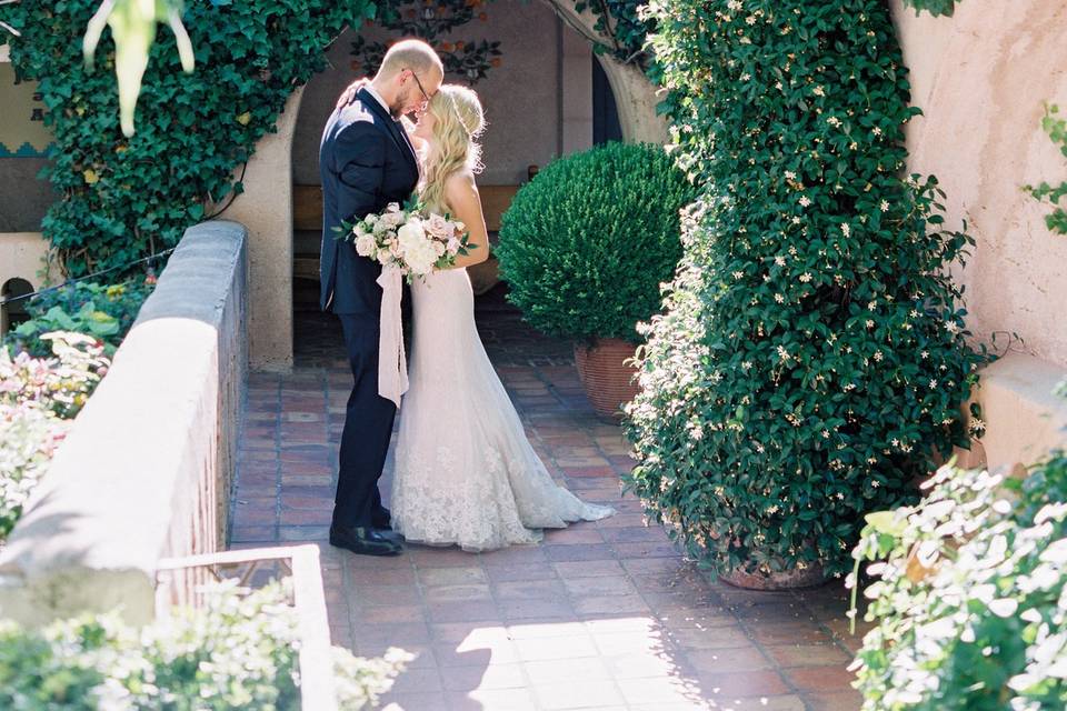 Groom and bride kissing