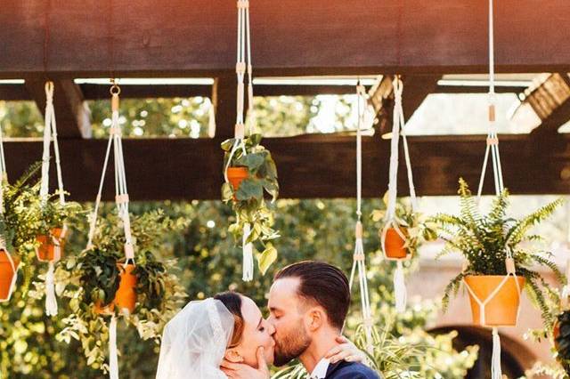 Bride and groom kissing