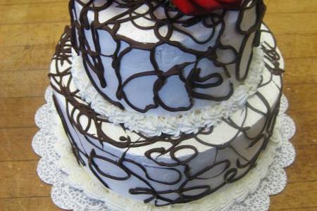 white and chocolate cakes w/bavarian cream and
chocolate ganache filling