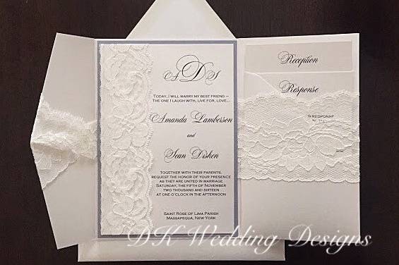 White invitation with blue borders and lace