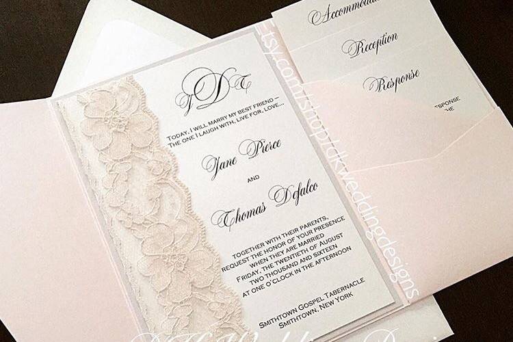 White invitation with lace