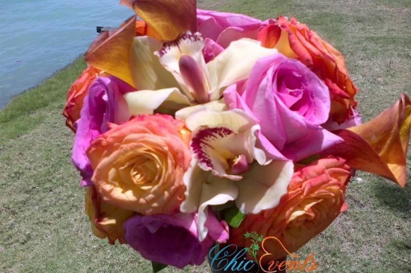 Circus roses with pink ross and blush cymbidium orchid bridal bouquet