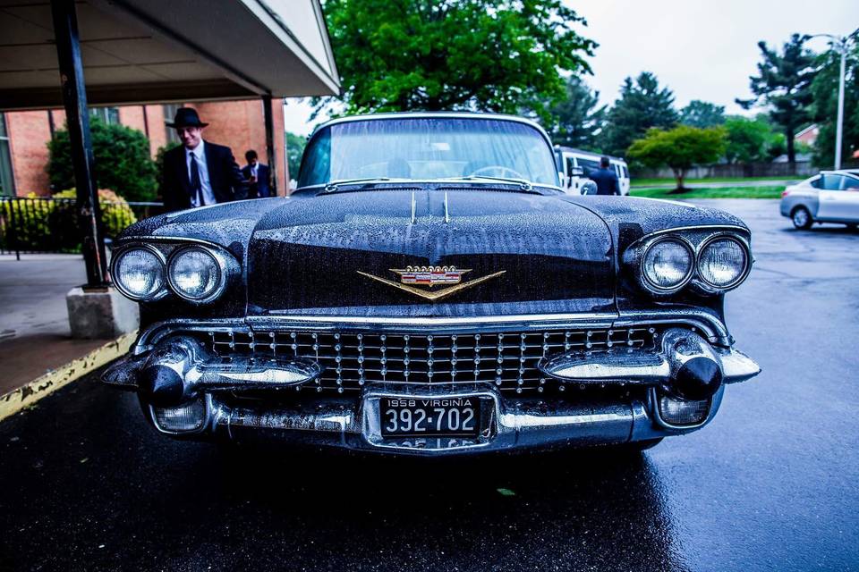 The groom surprised his new Mrs. with a vintage ride to transport them from the ceremony to the reception! Who doesn't love a 1958 Cadillac?! #SequinSoirees #MeetTheKums