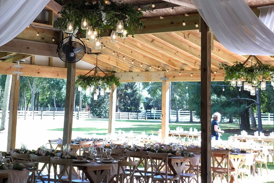 Ceiling drape with greenery