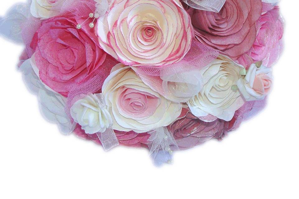 This lovely bouquet is made using different shades of Mauve, Pink, Rose, burgundy and ivory coffee filter paper Roses with coordinating pearl sprays, tiny foam Roses and organza Rose buds with ivory and pink tulle mixed into and surrounding the flowers. The handle is wrapped in ivory satin ribbon, ivory lace and delicate ivory bows.