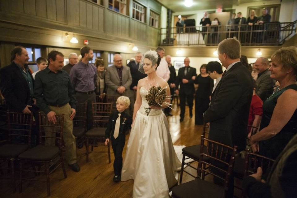 Walking mom down the aisle.