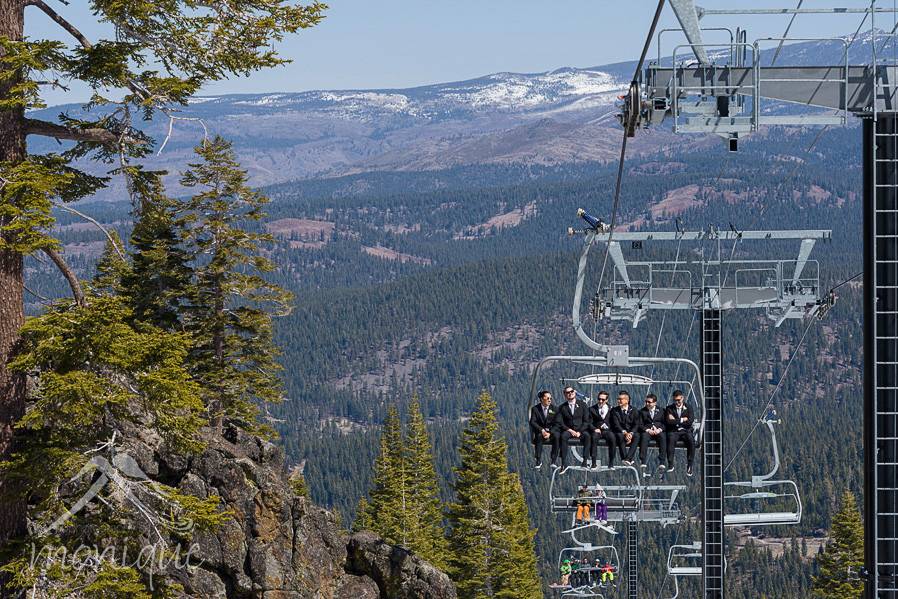 Groomsmen riding the chair lift at northstar to arrive at their mountain wedding destination!