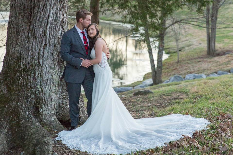 Bride & Groom by Tree