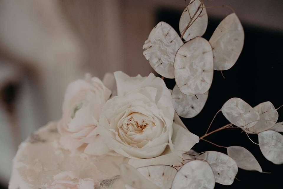 White cake with white flowers