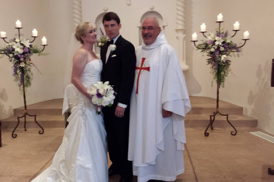 Newlyweds with Rev. David