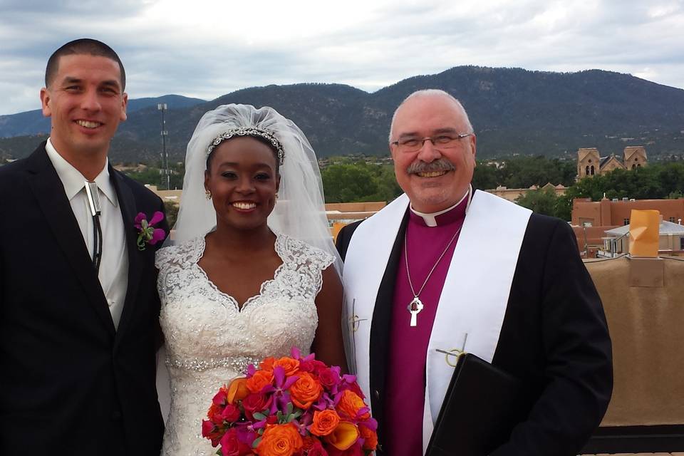 Officiant with the newlyweds