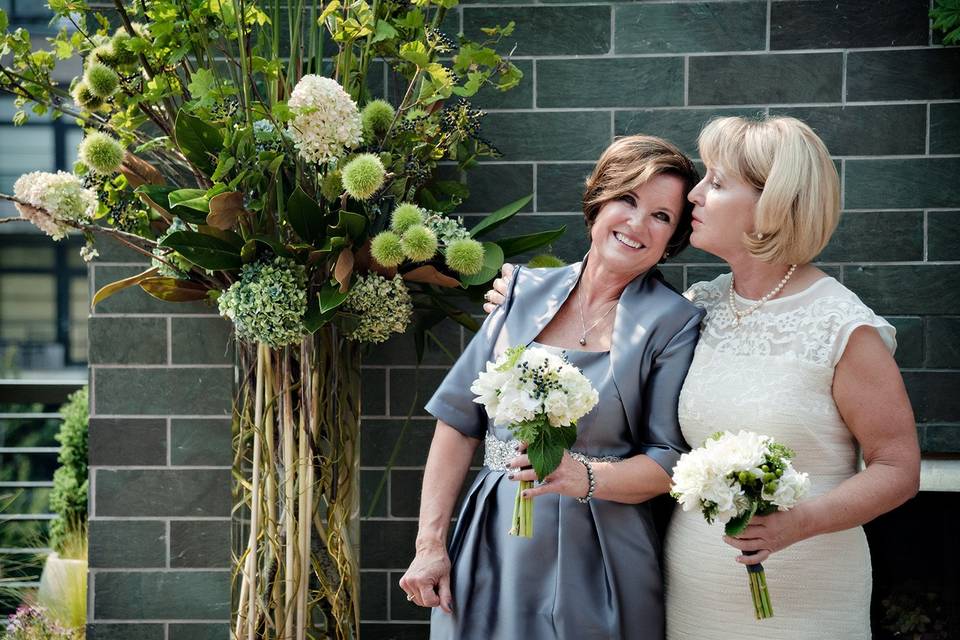 Noma and Gail celebrating 15 years after their commitment ceremony, at their wedding ceremony in 2015 at their urban rooftop terrace wedding location.
Photography by Jamie Bosworth Studio.