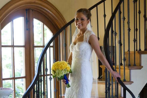 Bride in gown on stairs