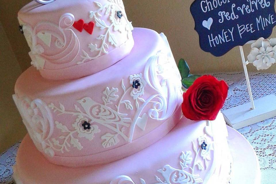 eye catching pink fondant cake with edible paper 