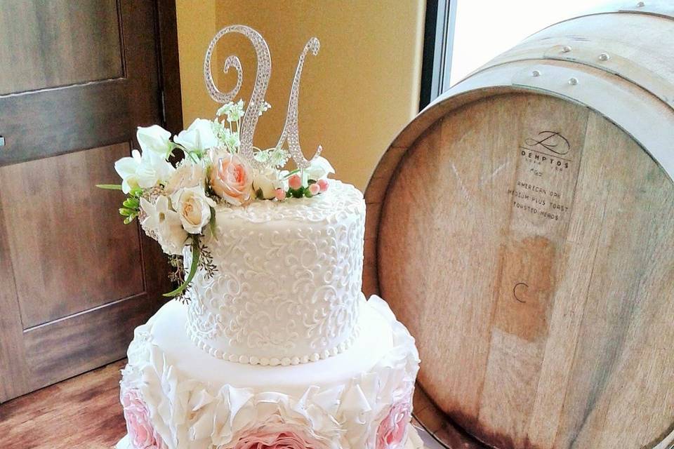 ombre pink fondant ruffle and rosette wedding cake