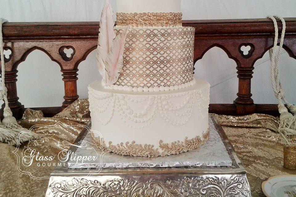 1920's Gatsby themed buttercream wedding cake with edible wafer paper feathers, edible gold details