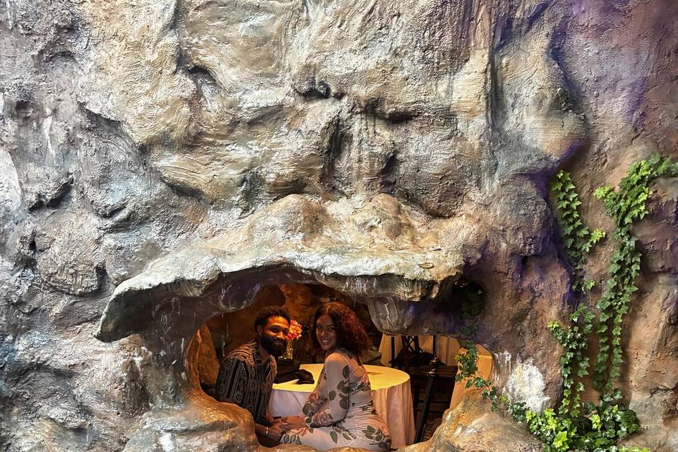 Couple in cave window