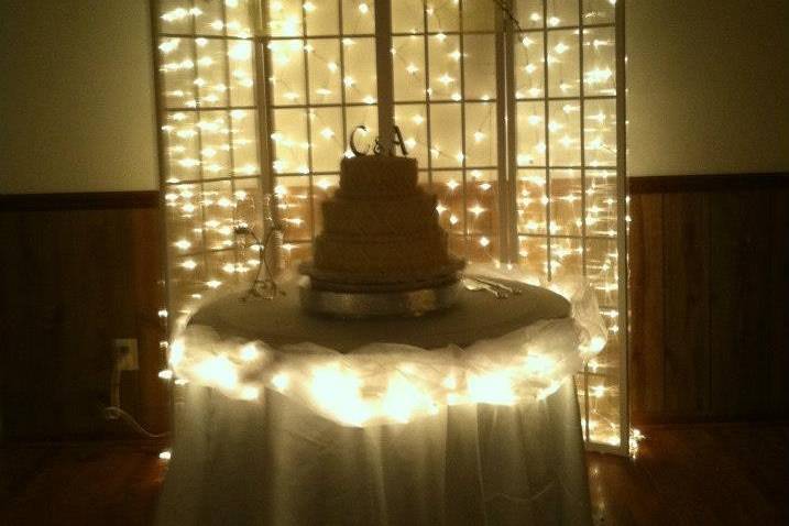 Lighted cake table and backdrop