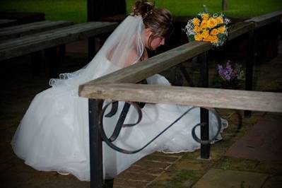 Bride, praying, bouquet, outside, chapel