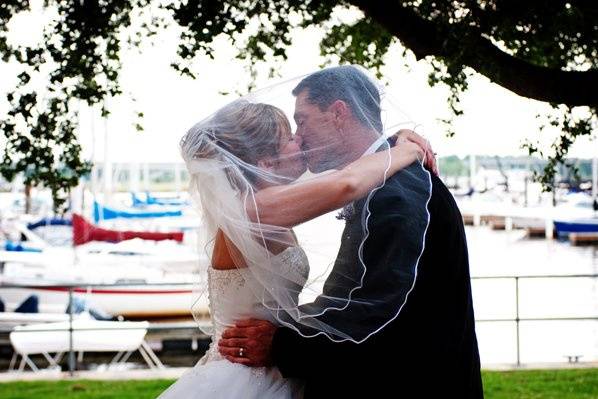 Couple kissing near marina