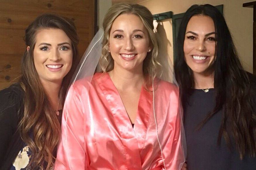 Bride with makeup artists