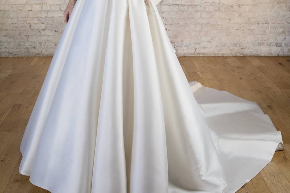 Wedding dress by Stella York