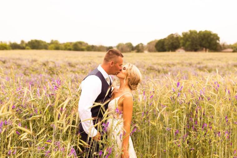 Kissing in a field