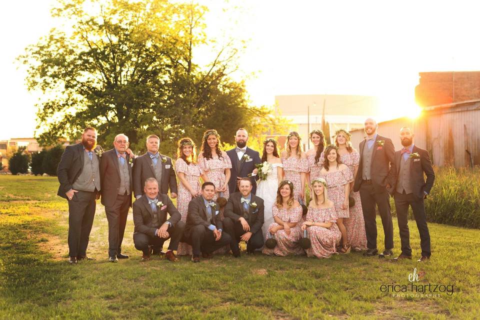 The couple with the bridesmaids and groomsmen