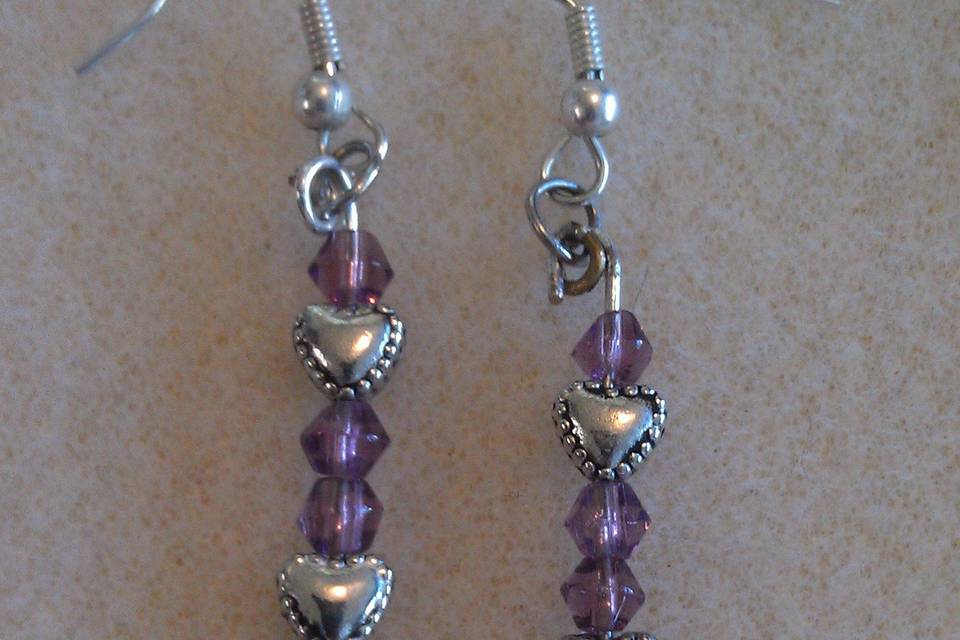 These are Purple Swarvoski Crystals with Tibetan Silver Heart Earrings it went with a set for a bridesmaids set
All Earring come with backings and the Tibetan Silver is Lead & Nickel Free.
This set went for $30 a set