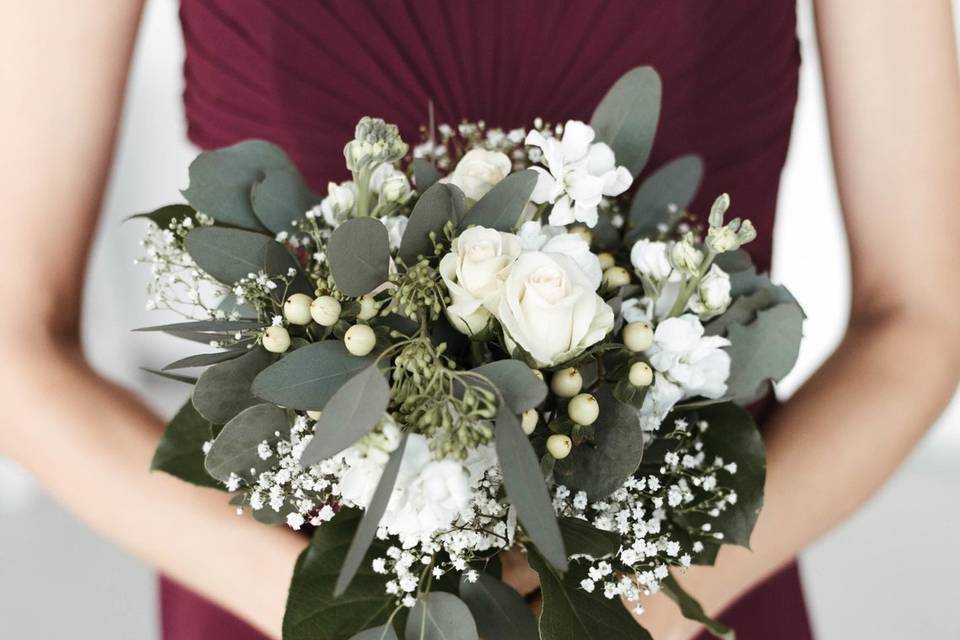 Bridesmaid with white bouquet