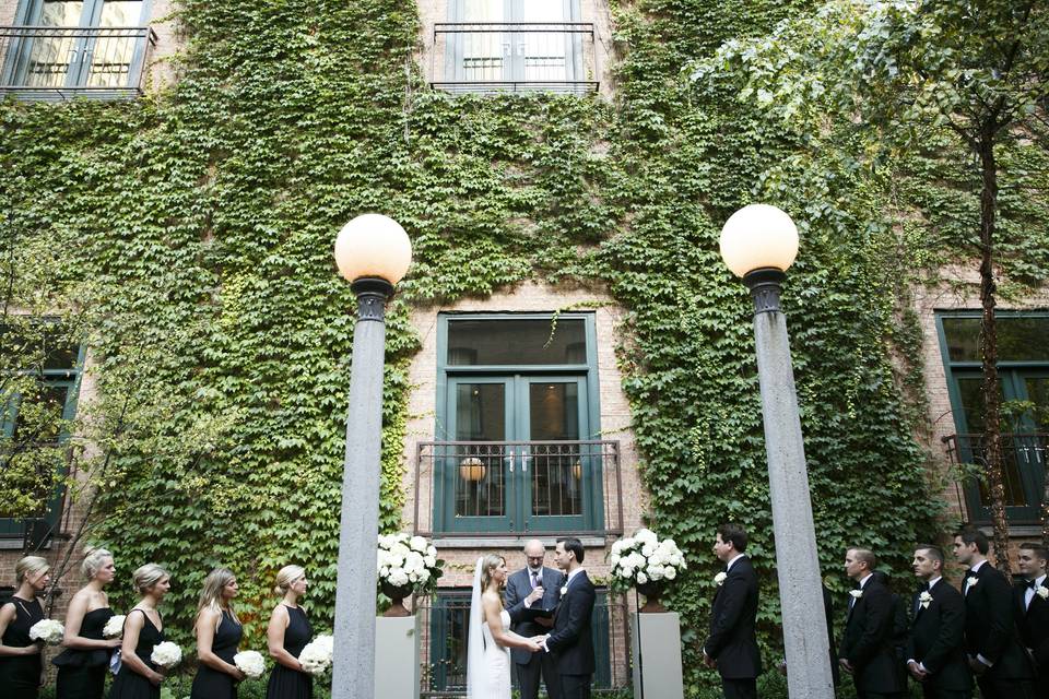 Ceremony in CourtyardPhoto Credit: Husar Photographyhttp://www.husarphotography.com