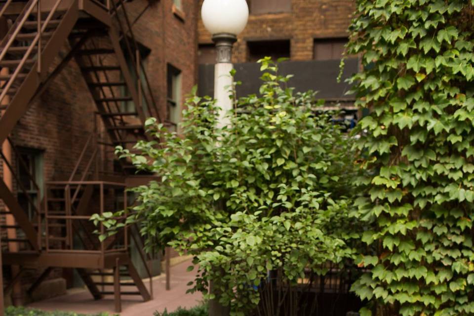 Seating area in Ivy Room courtyardPhoto by Cristina G. Photographyhttp://cristinagphoto.com/https://hmrdesigns.com/