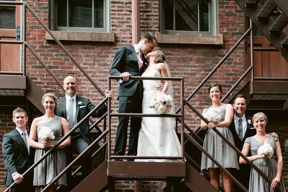 Wedding party on fire escape stairs in Ivy Room CourtyardPhoto Credit: Caili Helsper Photographyhttp://www.cailihelsper.com/