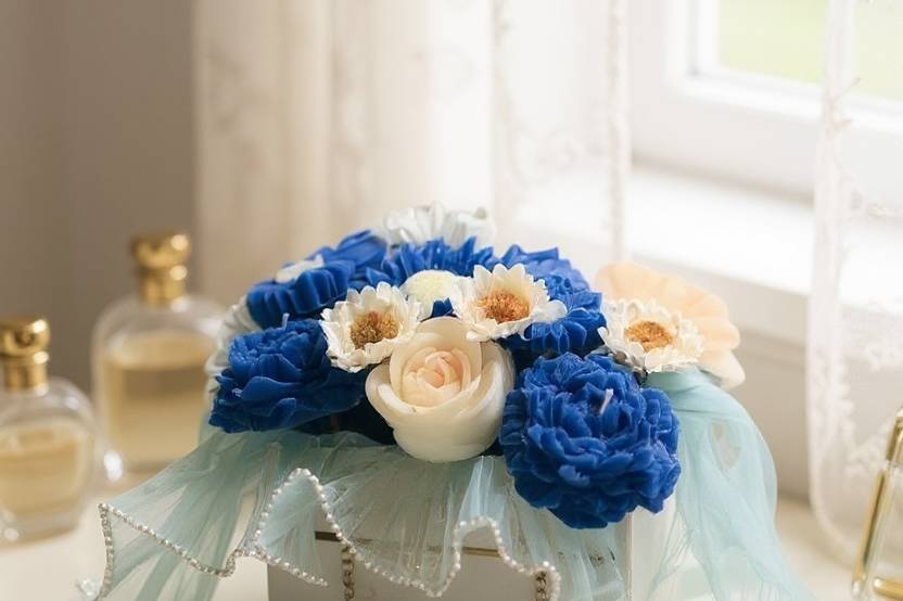 Bouquet of candle, flowers,