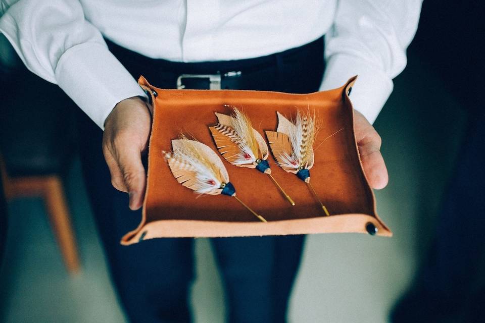 Custom fishing-inspired boutonnieres