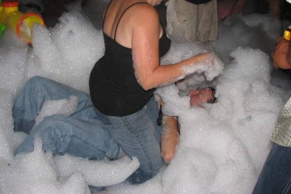 DJ Joe being tackled at his Foam party. Was lots of FUN!!!!