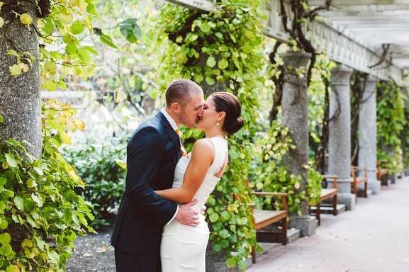 Newlyweds kissing