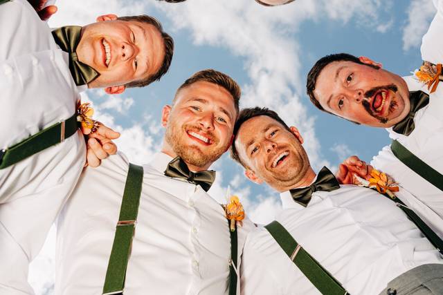 Groomsmen huddle