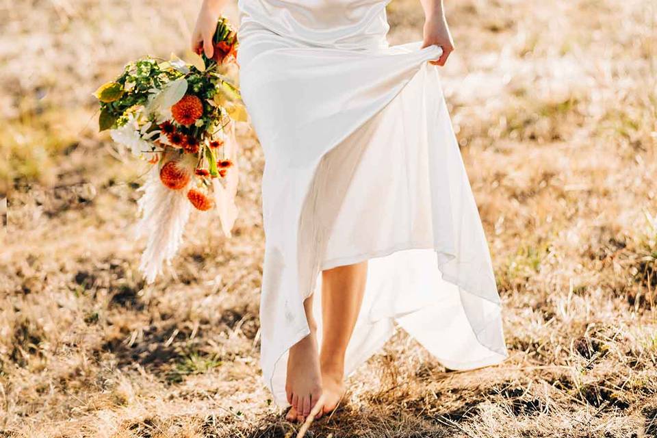 Bride in gown with flowers