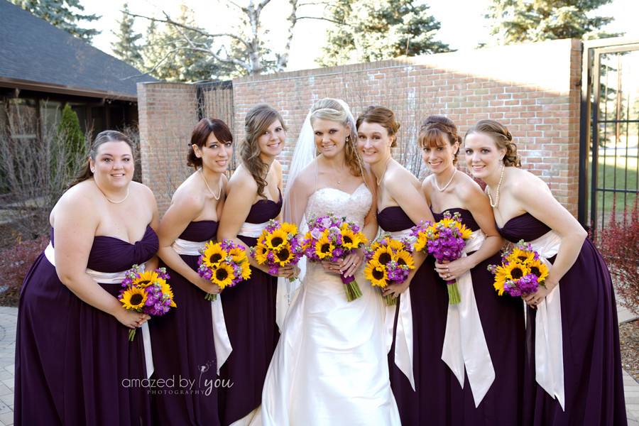 With sunflower bouquets