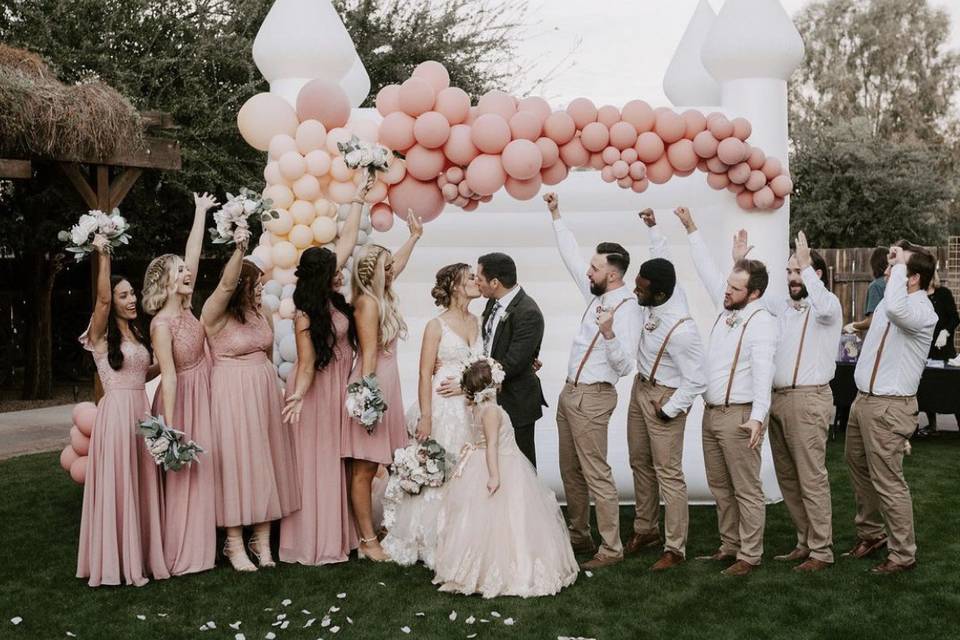 A kiss by the bounce house