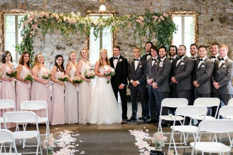 Floating arbor and bridal party, Floral design by Anything's Possible Events