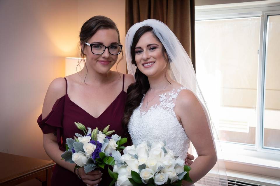 Bride and bridesmaid