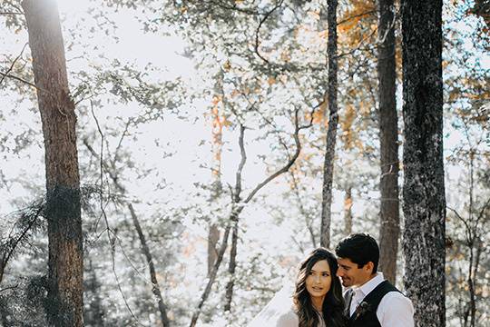 Bride and groom in the forest