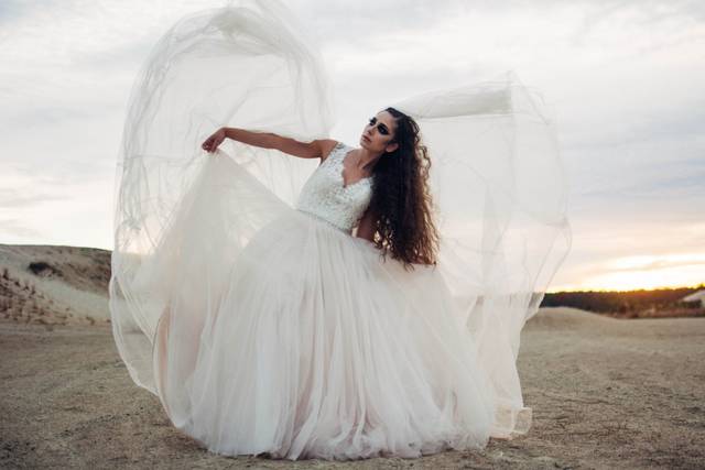 Bride dancing at sunset