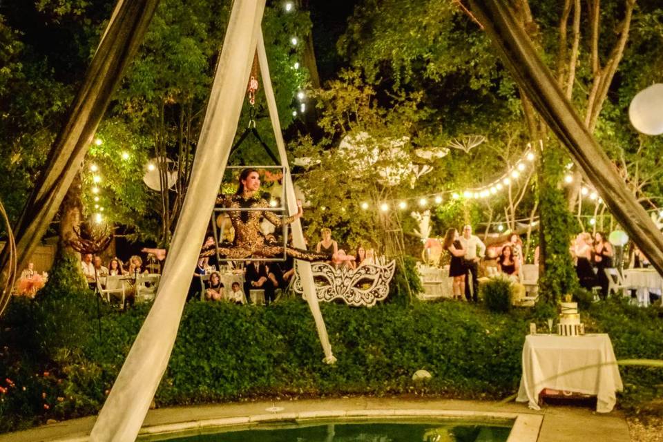 Aerialist over a pool